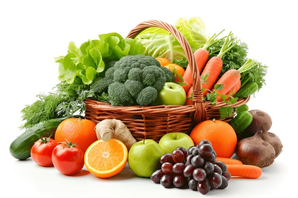 Fresh organic fruits and vegetables in wicker basket