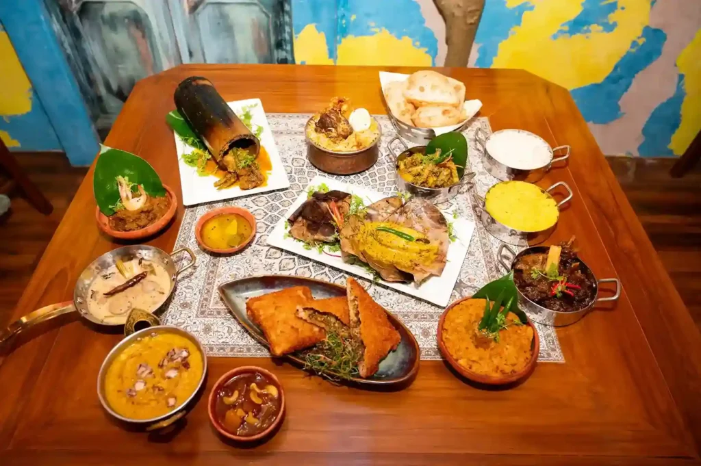Traditional Bengali thali showing a balanced meal with multiple dishes served together
