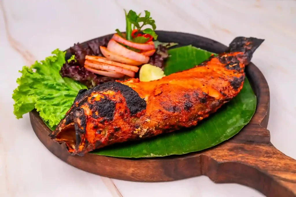 Traditional Bengali meal setup served in a homestyle dining environment in Salt Lake, Kolkata